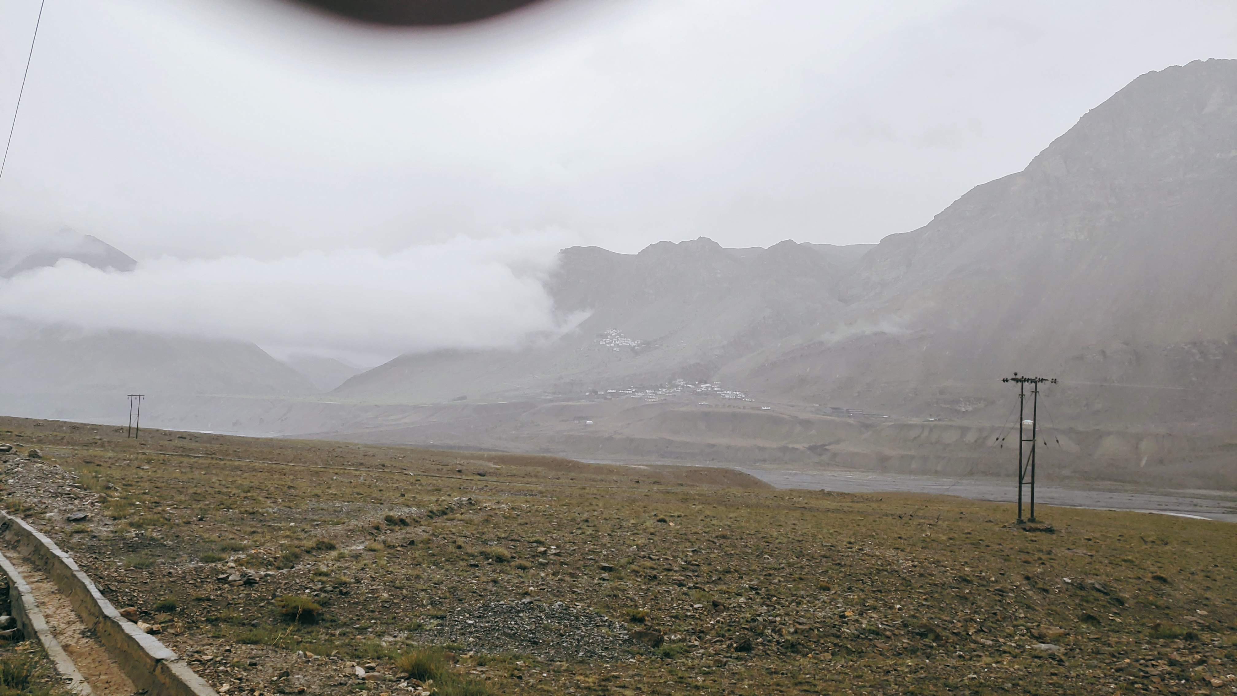 KYE MONASTERY IN BACKGROUND DURING RAINY SEASON