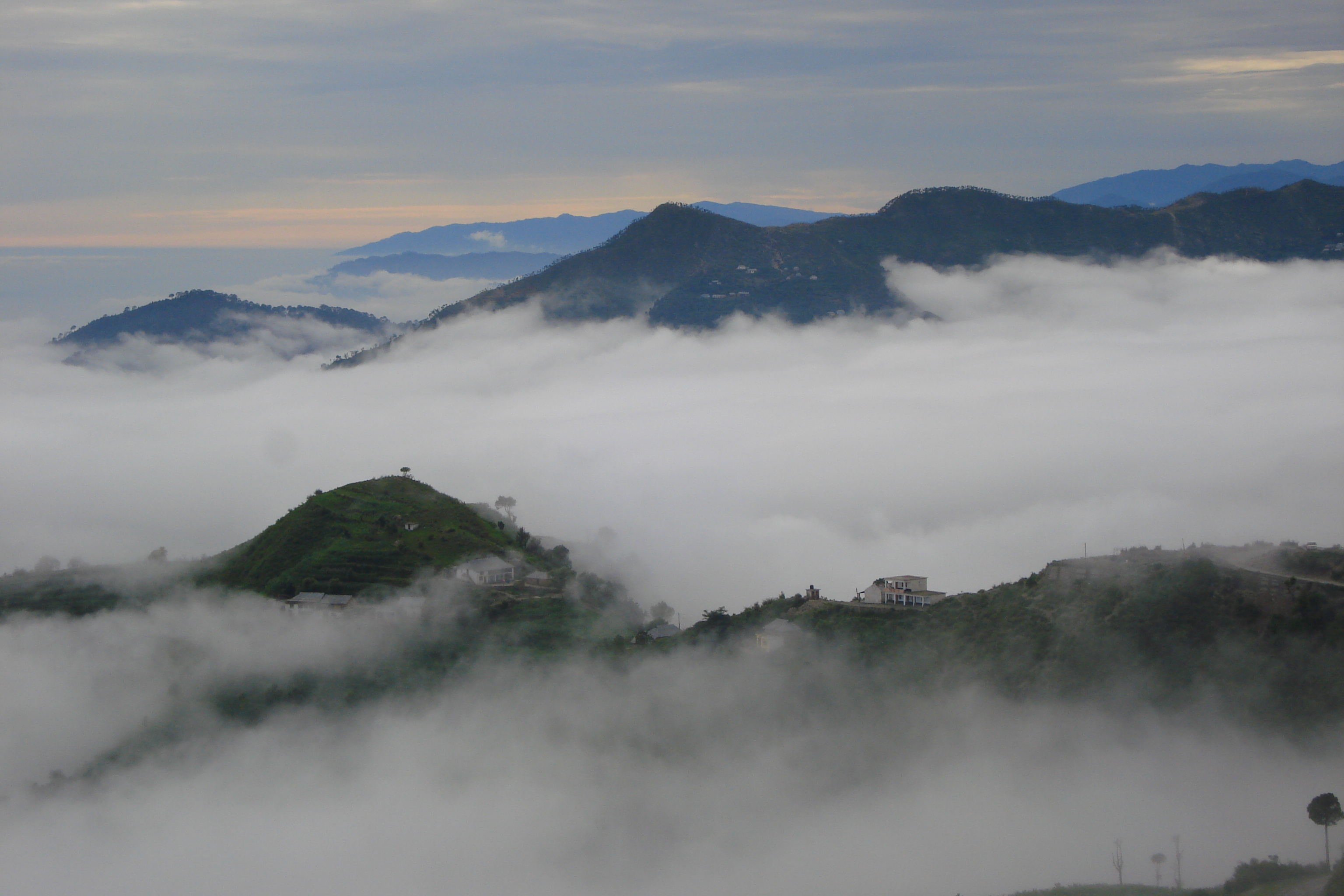 VIEW OF CLOUD STRICKEN CHOWARI FROM JYOT, CHAMBA