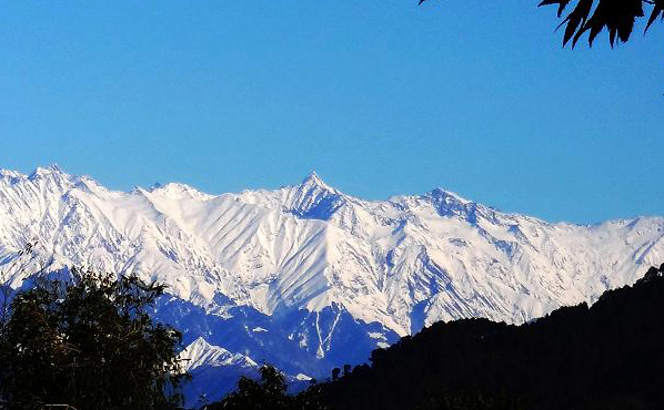 VIEW OF SNOWFALL ON DHAULADHAR RANGE